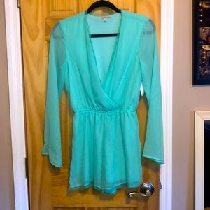 Plunging neckline long sleeve romper.